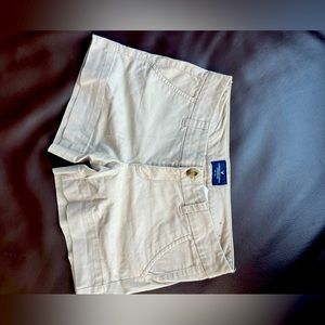 American Eagle beige mini shorts.